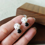 Star Dust Onyx Earrings Held