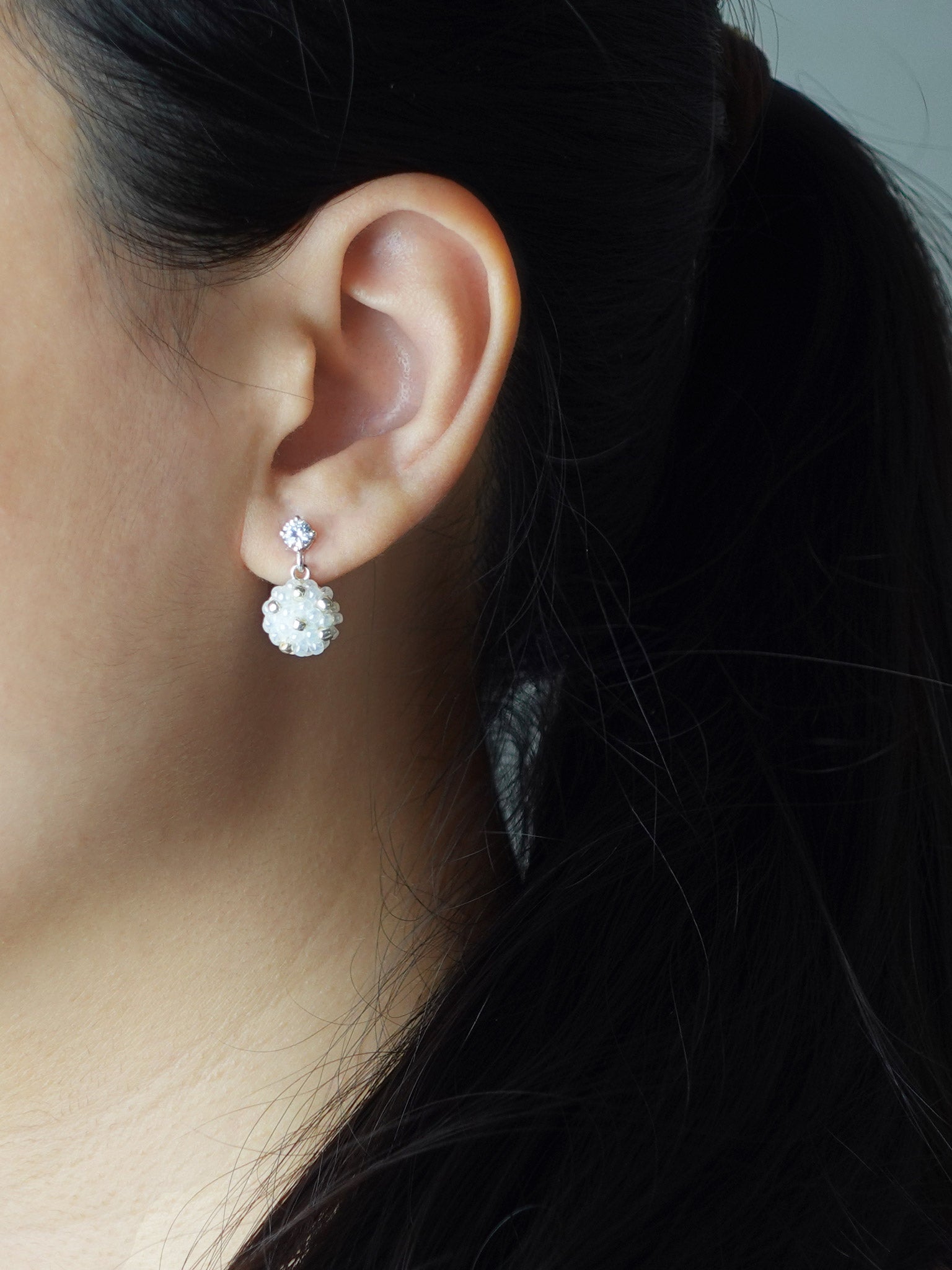 Star Dust Petite CZ Drop Earrings Model