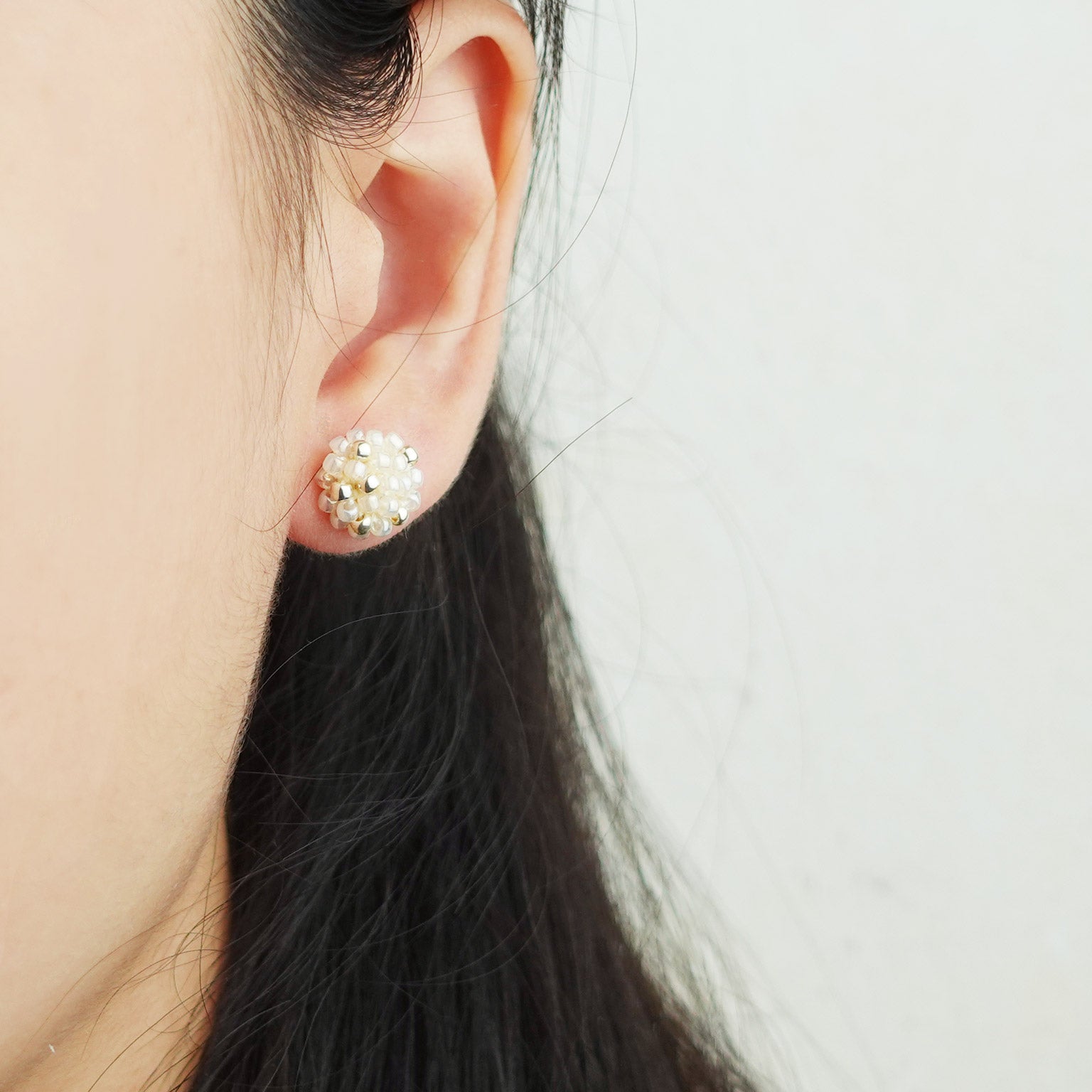 Star Dust Petite Stud Earrings in Ivory Model