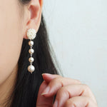 Thea Star Dust Earrings in Ivory Model