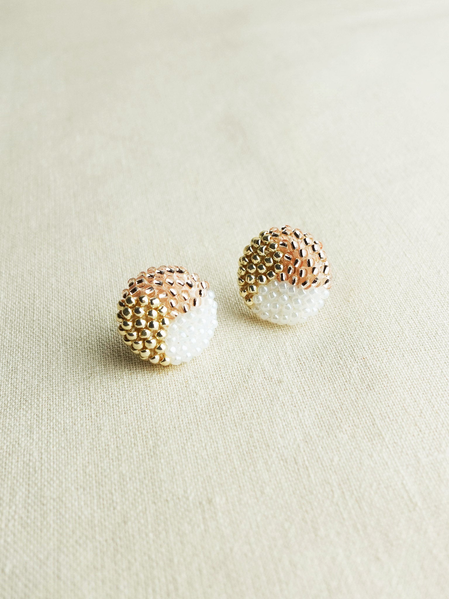 Trio Maxi Stud Earrings in Champagne Pink Front