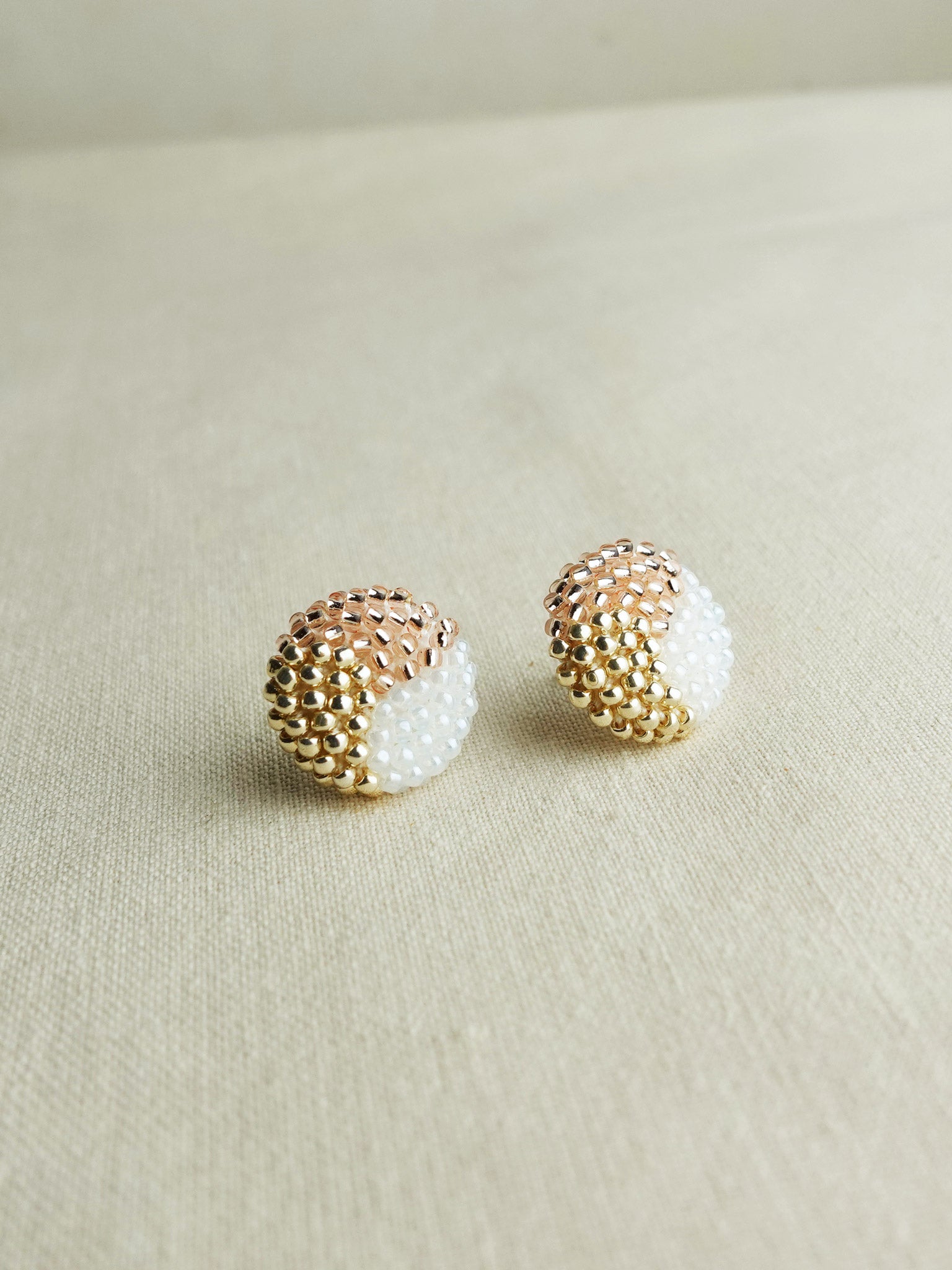 Trio Maxi Stud Earrings in Champagne Pink Left