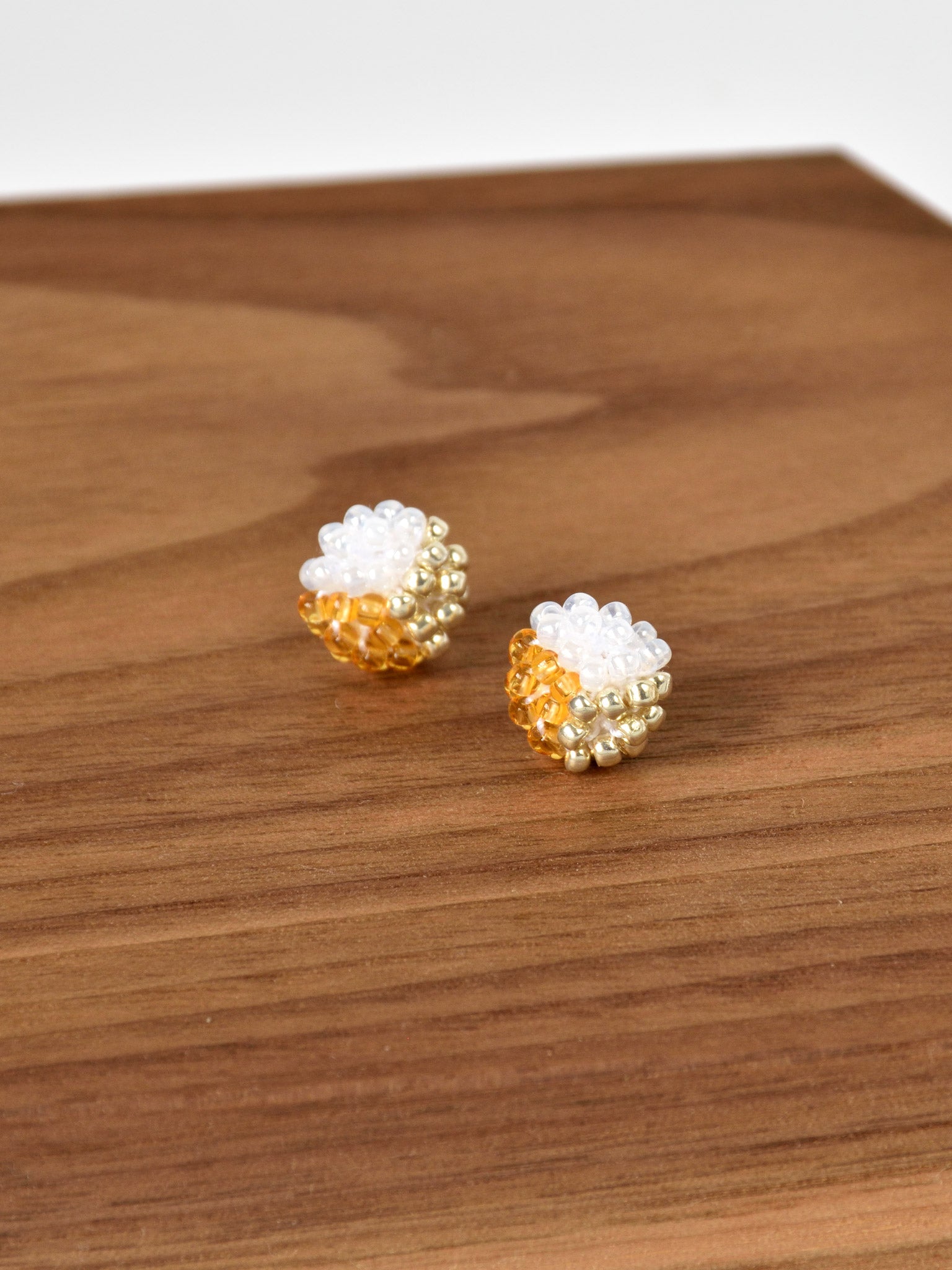 Trio Stud Earrings in Topaz Display