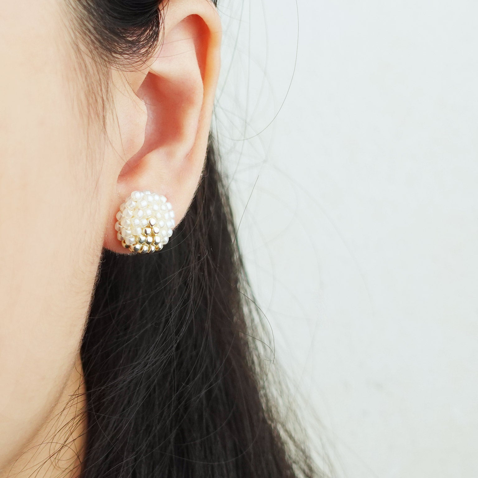 Two Ninths Stud Earrings in Ivory Model