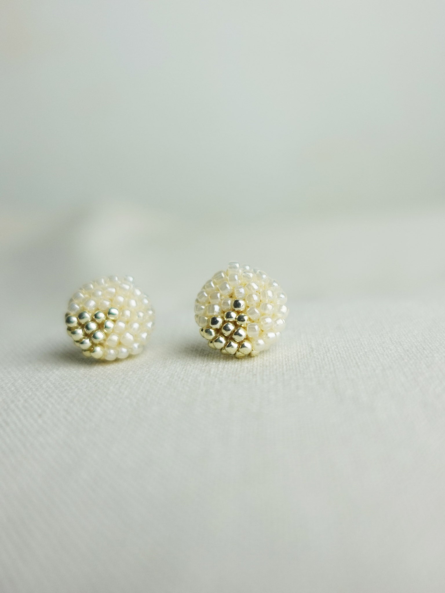 Two Ninths Stud Earrings in Ivory Right